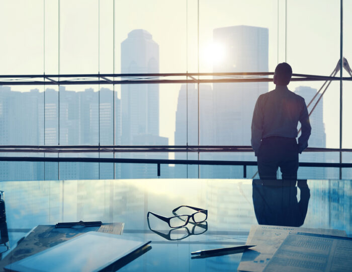Businessman,In,A,Big,Office Businessman,In,A,Big,Office