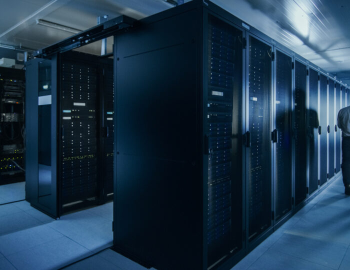 Shot,Of,An,It,Admin,With,A,Laptop,Computer,And Shot,Of,An,It,Admin,With,A,Laptop,Computer,And